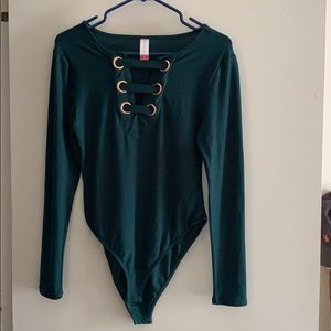 Long sleeve bodysuit. NEVER WORN
